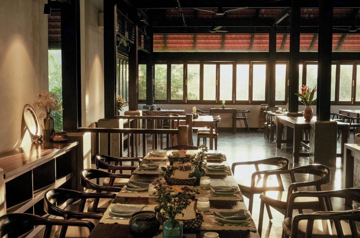 Elegant restaurant interiors designed with soft earth tones, emphasizing a harmony between tradition and modernity