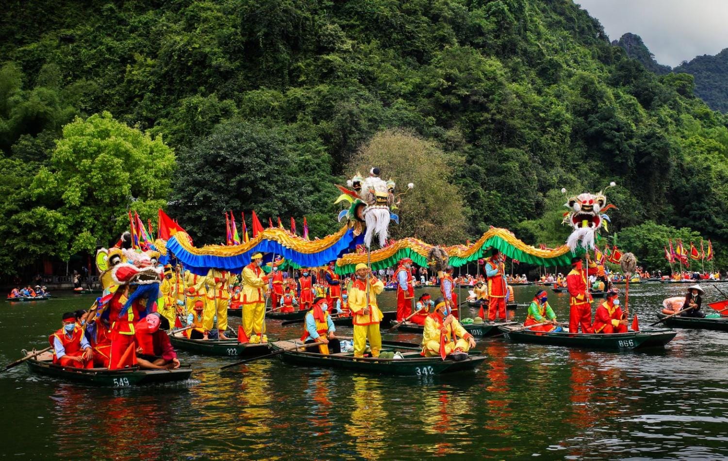 Scenes from the vibrant Truong Yen Festival (Cờ Lau Festival), held annually in the third lunar month at Hoa Lư Ancient Capital.