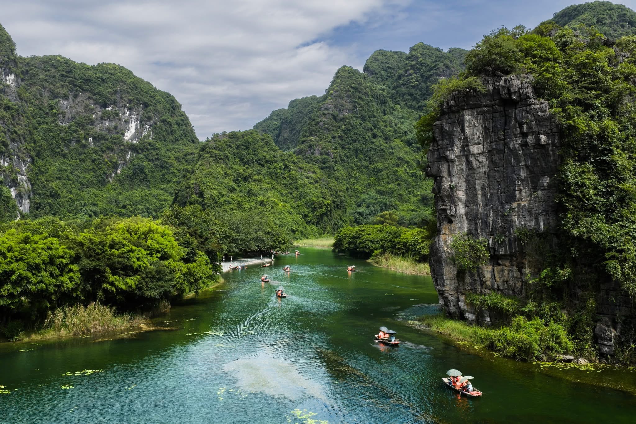 A gentle reminder to speak softly to preserve the quiet environment of Van Long Lagoon.
