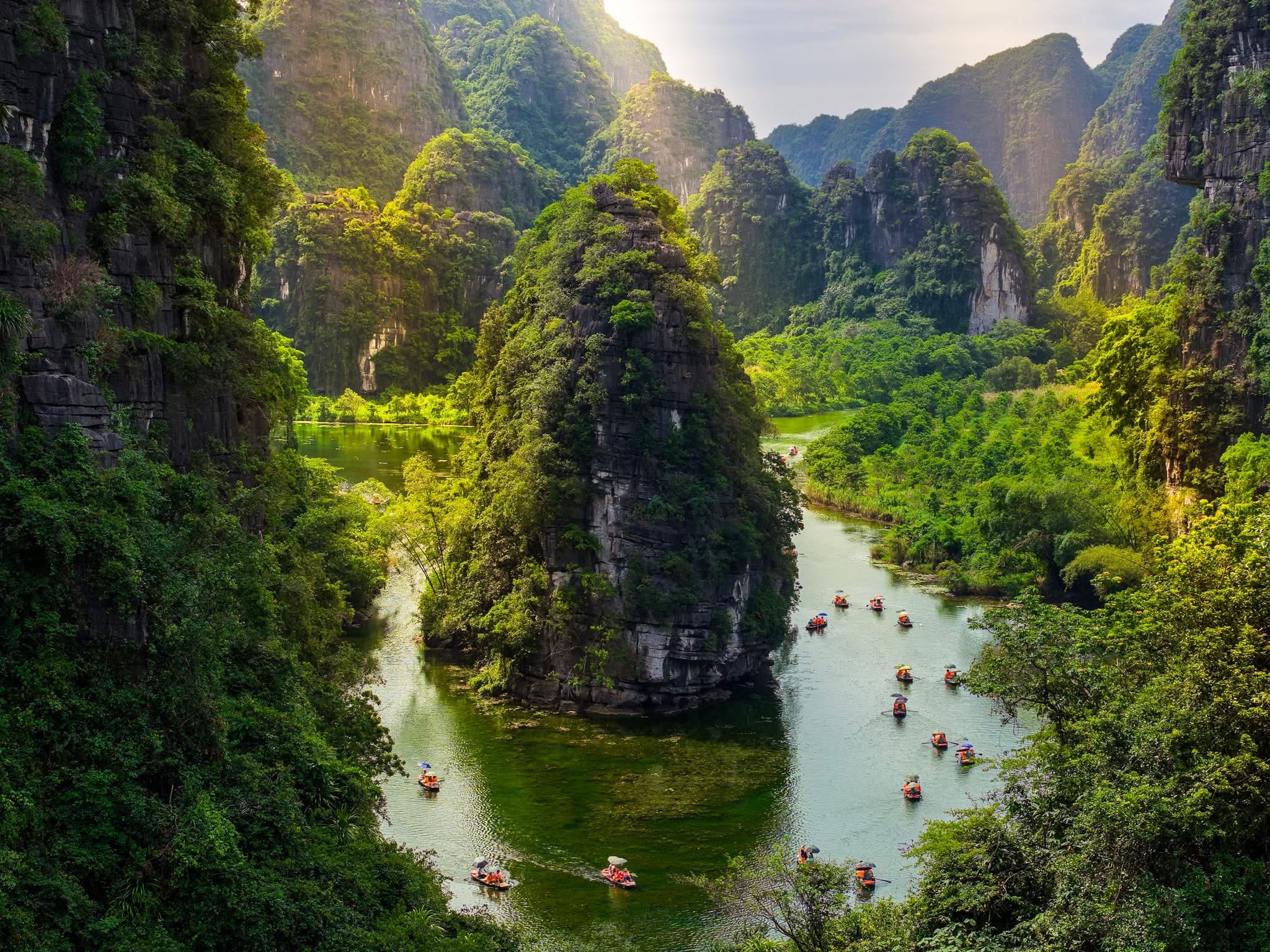Drifting through the "Wave-less Bay" of Van Long, the largest wetland nature reserve in Northern Vietnam.