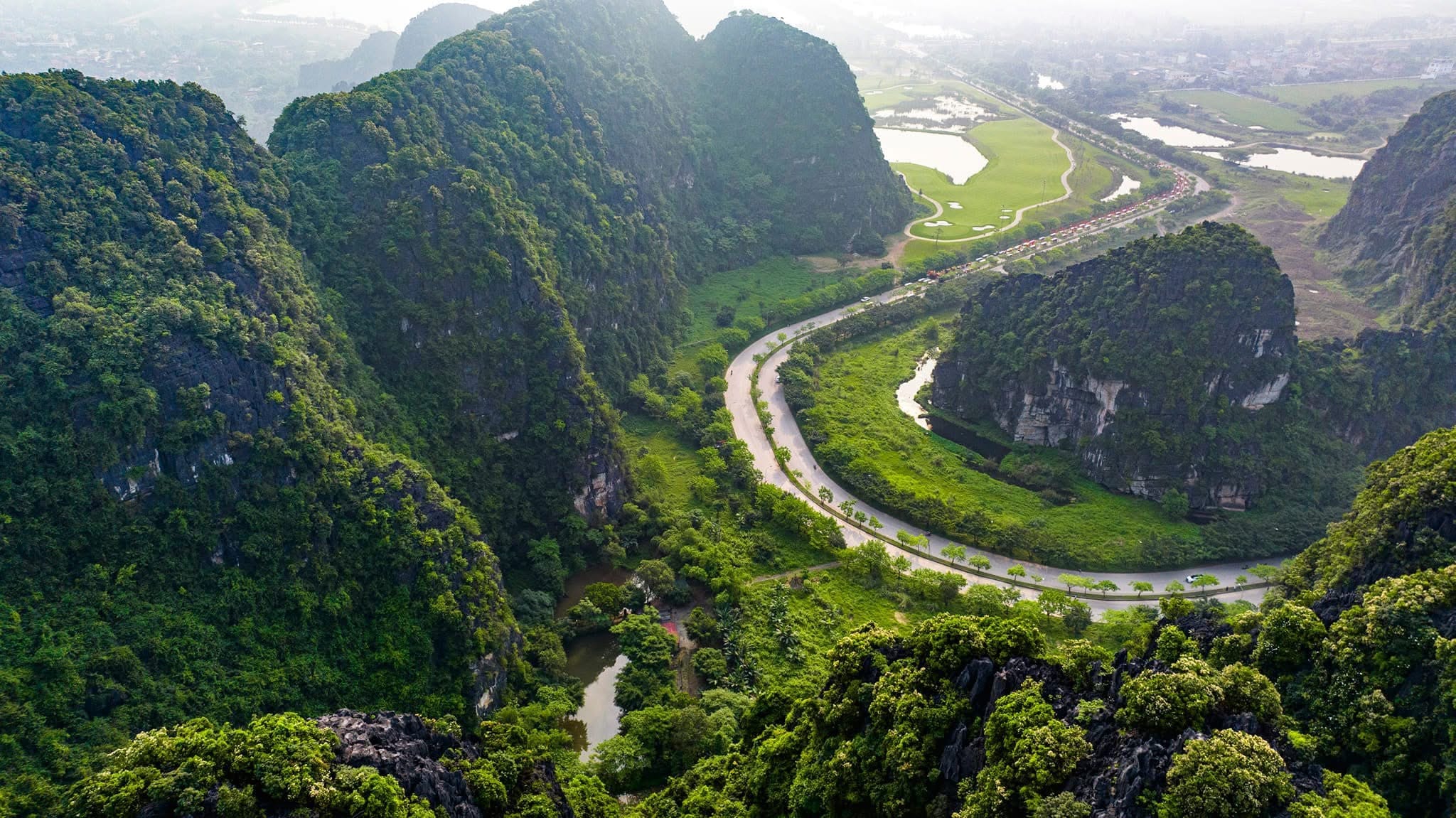 The rugged limestone mountains that historically formed a natural fortress, providing immense strategic value to Hoa Lư Ancient Capital.