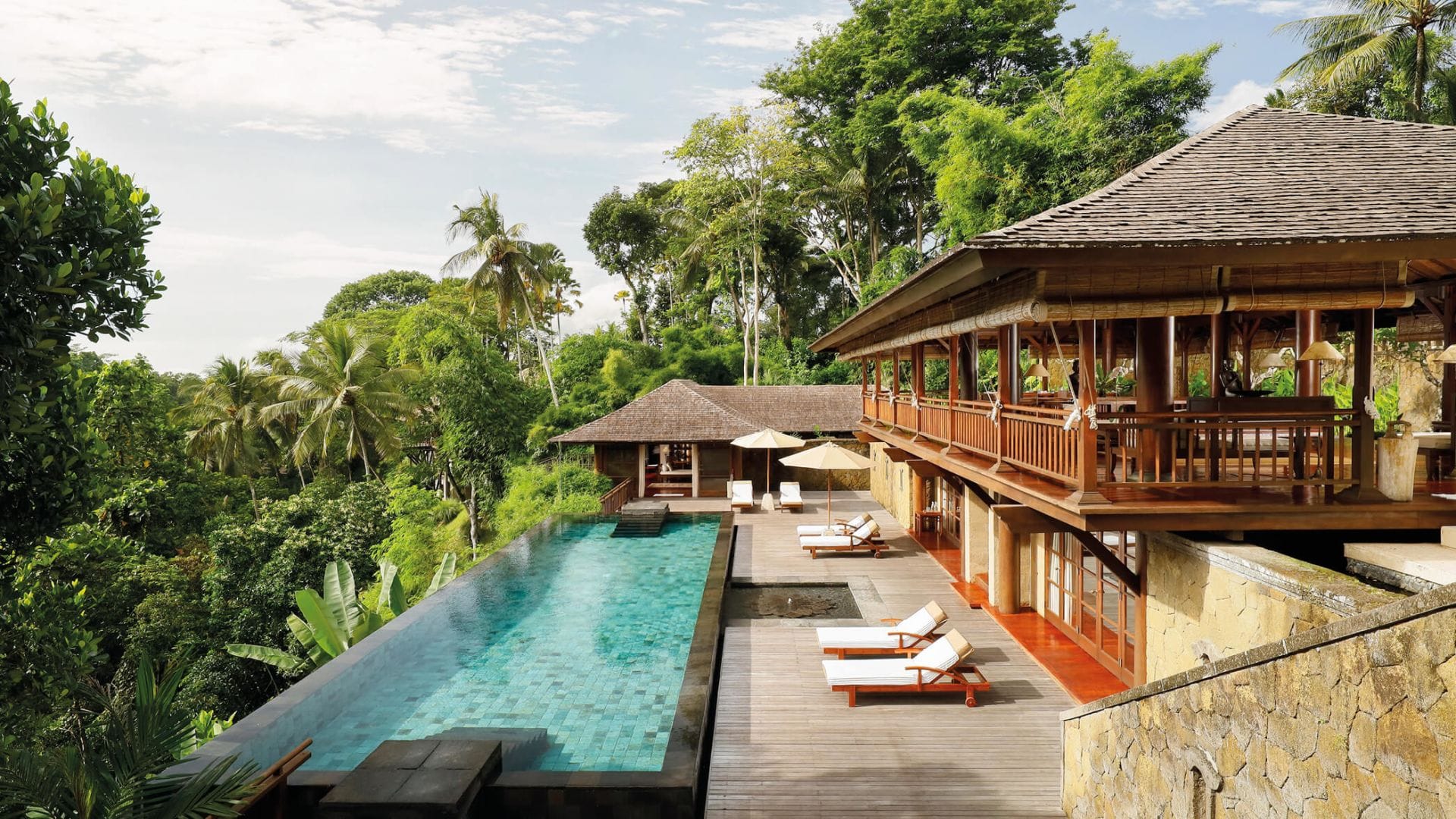 A private villa with views over the forest canopy, embodying sophisticated jungle luxury.