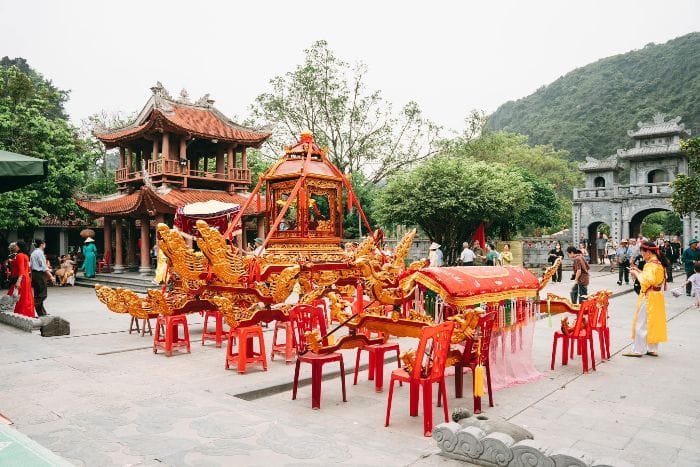 Observing the traditional rituals that honor the Trần kings and their historical legacy.
