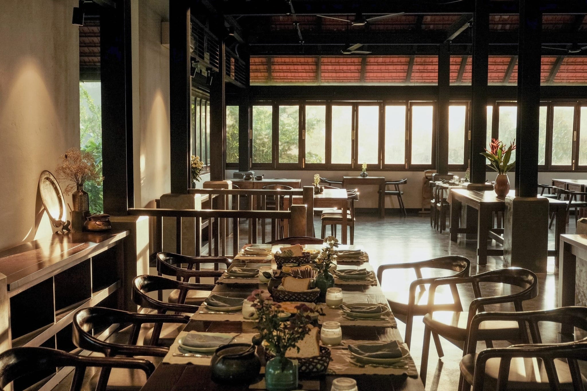 Traditional Northern Vietnamese architecture brought to life with elevated, rustic elegance.