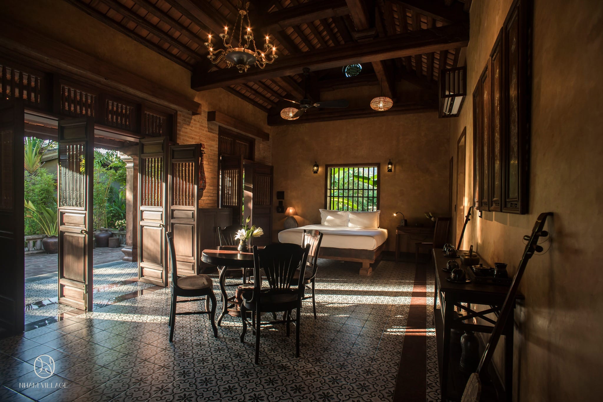 Nham Village, a captivating Ninh Binh Luxury Resort that connects guests intimately with local rural life and traditions.