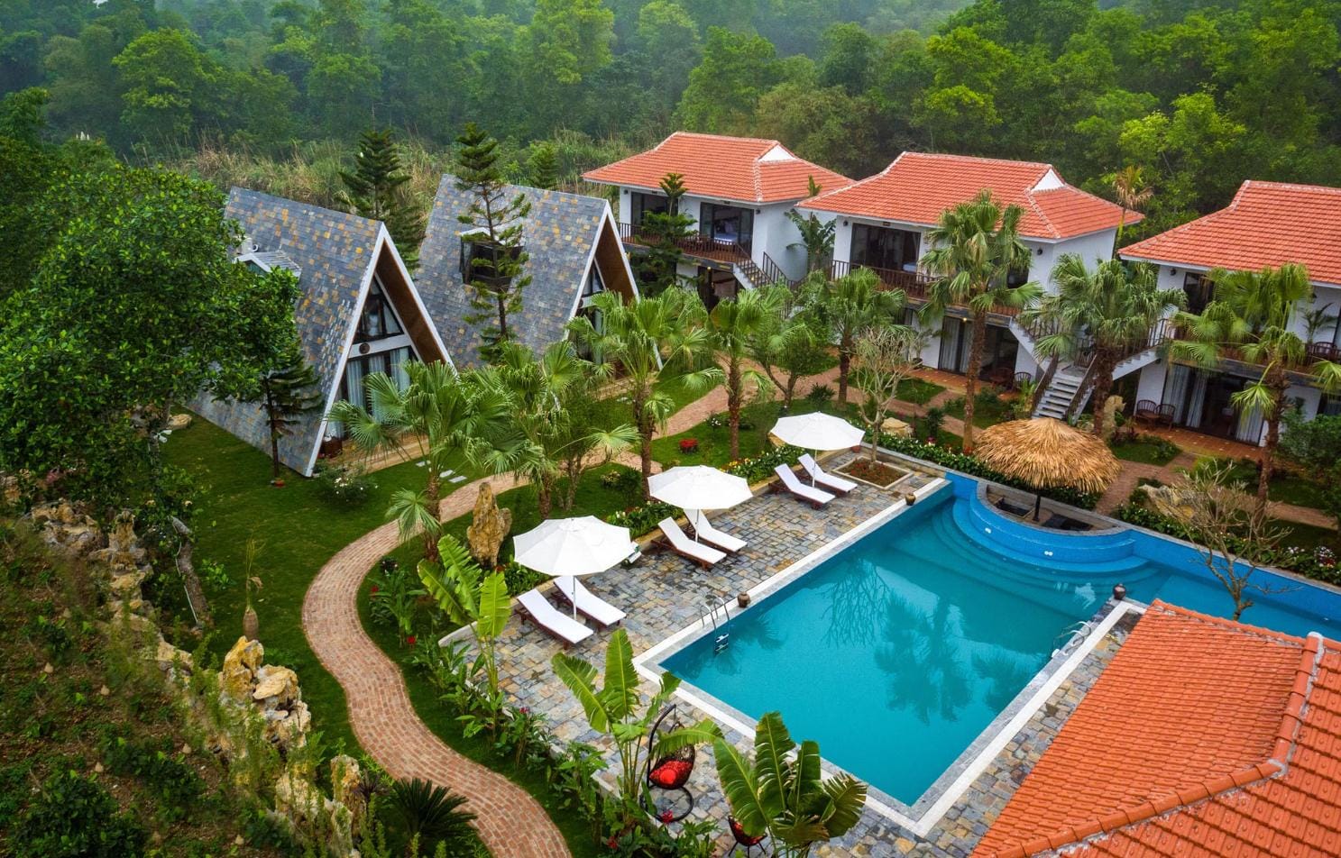 Lush greenery and courtyards designed for travelers who appreciate privacy and spiritual surroundings.