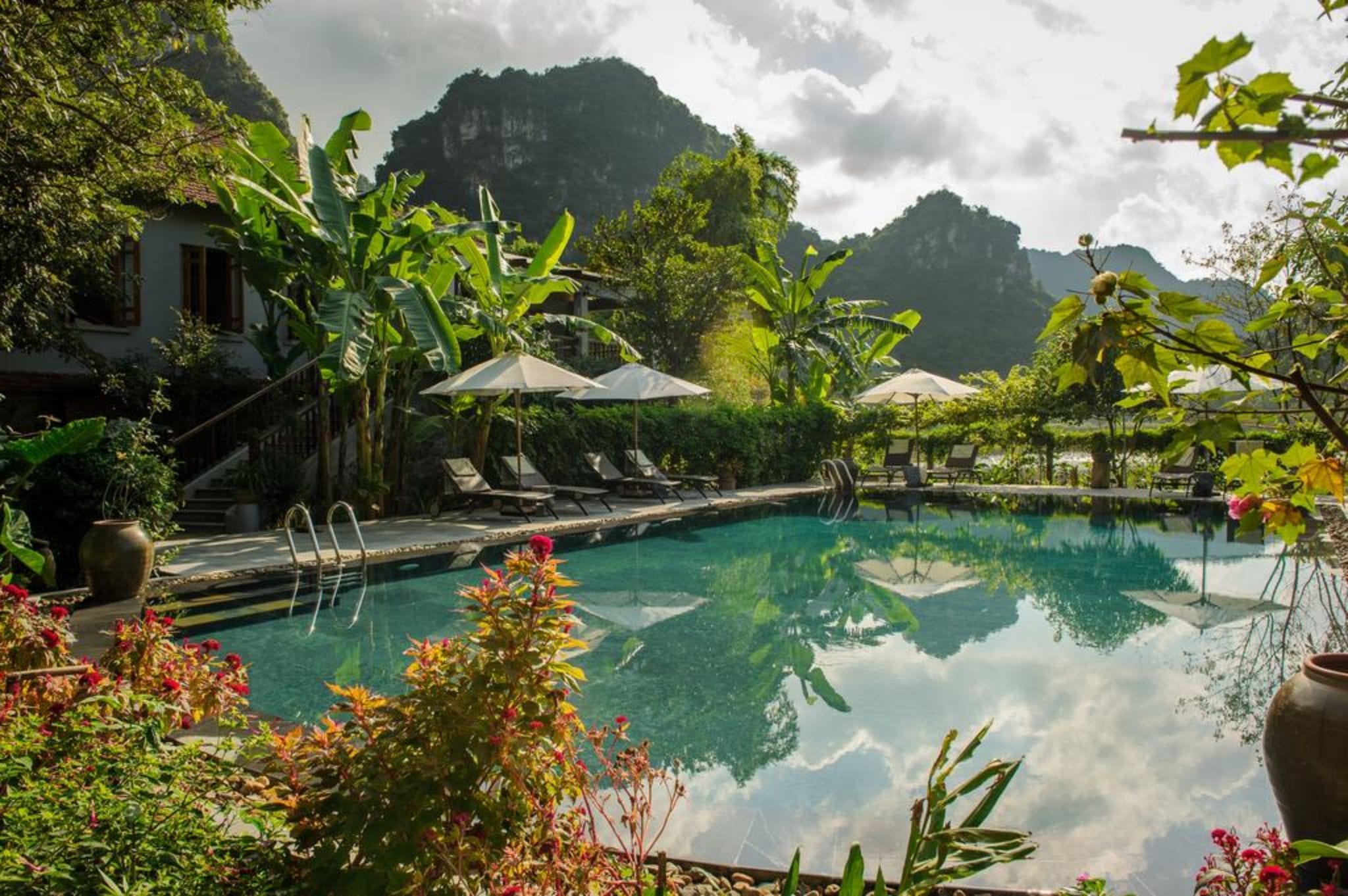 Open green spaces and bungalow-style rooms that invite the majestic outdoors into your living space.