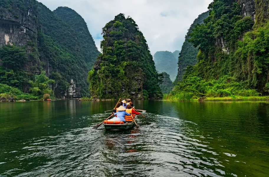 Deciding between Trang An vs Tam Coc for your ultimate Northern Vietnam adventure.