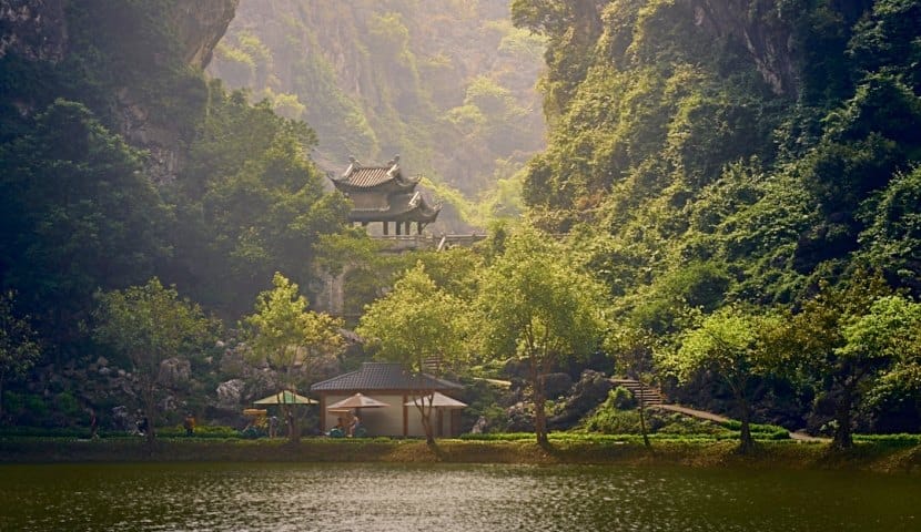 Discovering secret emerald lakes and hidden cave temples on a premium track of couples travel vietnam